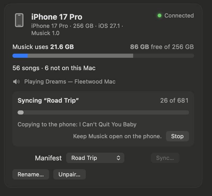 A paired iPhone's card on the Mac, syncing Road Trip: 26 of 681 songs copied